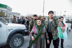 Hawa Alam Nuristani, the head of the Independent Election Commission of Afghanistan, arrives for the final presidential election results announcement in Kabul on February 18.