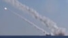 Footage made available by the Russian Defense Ministry in December 2015 purports to show a submarine launching cruise missiles in the Mediterranean Sea.