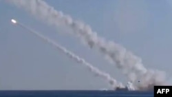 Footage made available by the Russian Defense Ministry in December 2015 purports to show a submarine launching cruise missiles in the Mediterranean Sea.
