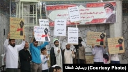 Anti Rouhani protest in Qom, Iran, August 16, 2018.