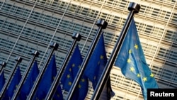 Флаги Евросоюза у его штаб-квартиры в Брюсселе