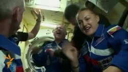 U.S.-Russian Crew Reaches Space Station
