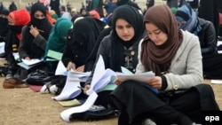 Afghan students sit an exam in Kunduz, Afghanistan, before the Taliban's takeover of the country in August 2021.