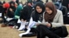 Afghan students sit an exam in Kunduz, Afghanistan, before the Taliban's takeover of the country in August 2021.