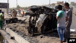 آثار إنفجار سيارة مفخخة في مدينة الصدر ببغداد