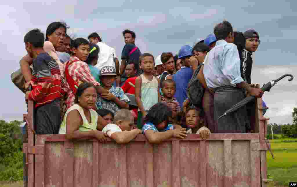 Rakhine people flee from the conflict area in Burma's Rakhine State.