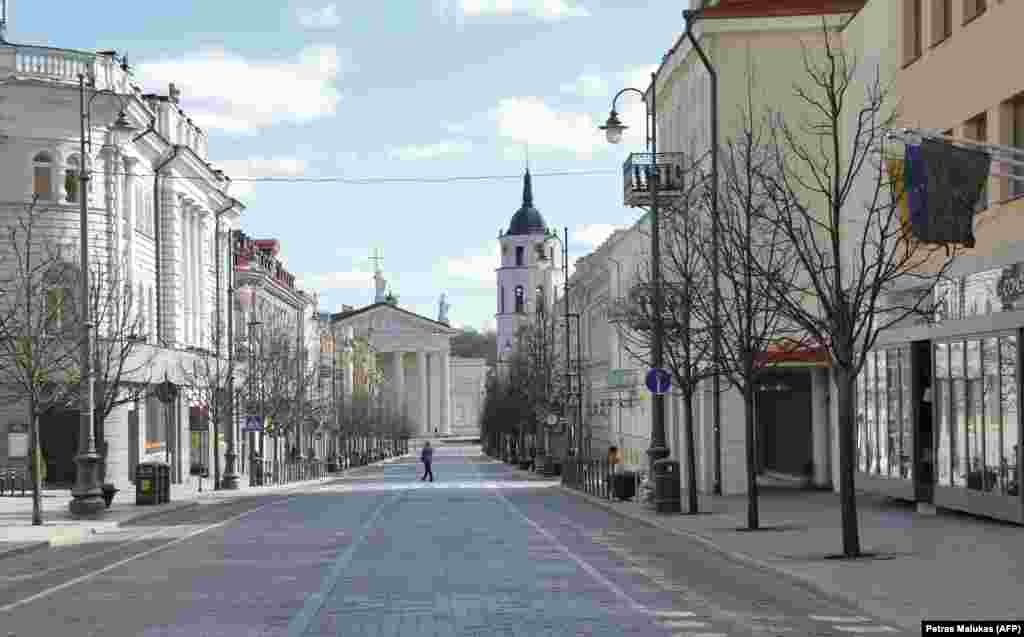 Lithuania - An empty street leading to the Vilnius Cathedral in the Old Town of Vilnius, 22Mar2020