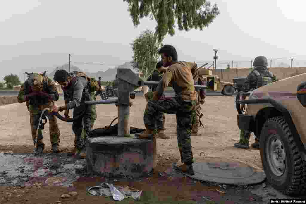 The battle-weary fighters freshen up at their base after the July 13 rescue mission.&nbsp;The dangerous assignment came at dawn, just minutes after the elite soldiers had returned to their base from a late-night mission.&nbsp;