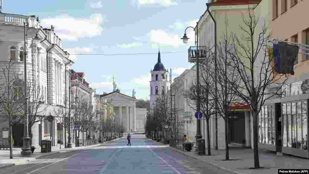Lithuania - An empty street leading to the Vilnius Cathedral in the Old Town of Vilnius, 22Mar2020