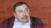 Ержан Утембаев, бывший руководитель аппарата сената парламента, осужденный по делу об убийстве Алтынбека Сарсенбаева. Каскелен, 22 января 2014 года.
