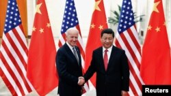 În decembrie 2013, vicepreședintele american Joe Biden, la acea vreme, s-a întâlnit cu președintele chinez Xi Jingping la Beijing. 