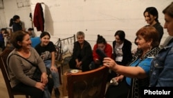 Nagorno-Karabakh - Residents of Stepanakert take cover in a bomb shelter, September 28, 2020.