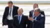 Russian President Vladimir Putin listens to Rosneft Chief Executive Igor Sechin as he visits the Zvezda shipyard in the far eastern town of Bolshoy Kamen, Russia September 8, 2017.