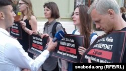 Many were holding posters saying, "Pavel Sheremet. 20.07.2016. Murderers still not found."