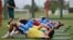 (FILES) Iran's players stretch during a training session at their base camp in Antalya on May 19, 2026.