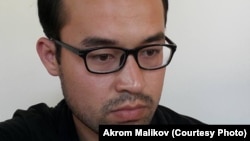 Акром Маликов.