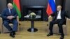 Russian President Vladimir Putin (right) meets with his Belarusian counterpart in Sochi on May 28