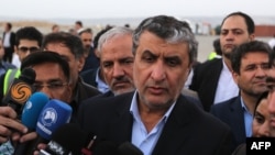 Mohammad Eslami, then minister of transport and housing, addresses the press on the sidelines of an inauguration ceremony of new equipment and infrastructure at Shahid Beheshti Port in the Iranian coastal city of Chabahar on February 25, 2019. 