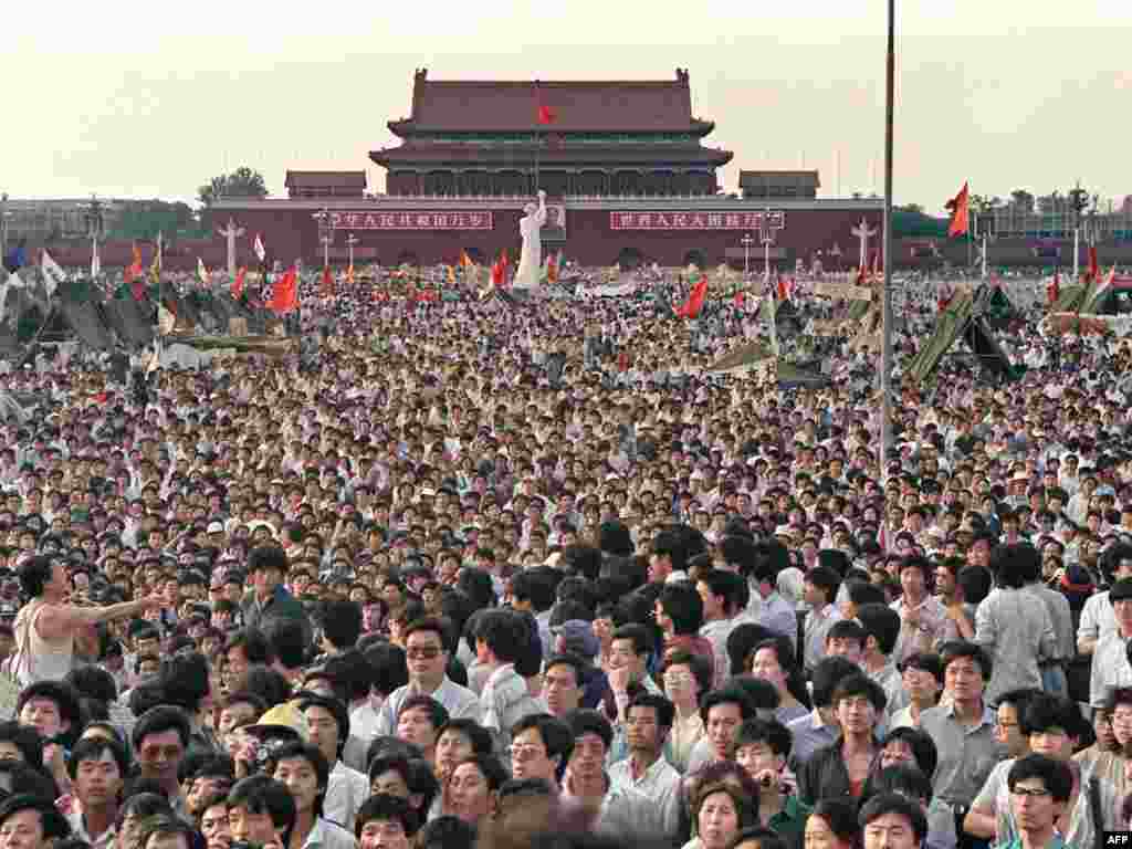 China -- Hundreds of thousands of protesters gather on Tiananmen Square in Beijing, 02Jun1989 - CHINA, Beijing : (FILES) This file photo taken on June 2, 1989 shows hundreds of thousands of Chinese gathering around a 10-metre replica of the Statue of Liberty (C), called the Goddess of Democracy, in Tiananmen Square demanding democracy despite martial law in Beijing. Hundreds, possibly thousands, of protesters were killed by China's military on June 3 and 4, 1989, as communist leaders ordered an end to six weeks of unprecedented democracy protests in the heart of the Chinese capital.