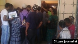 Uzbekistan - Overcrowded passport issuing department of Olot district of Bukhara region, 07Jule2014