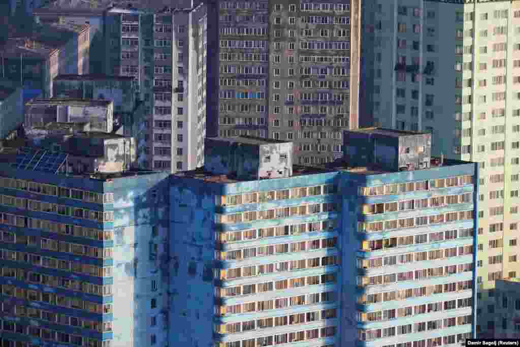 Decaying apartment blocks in Pyongyang. According to a report in The Guardian, many North Koreans rely on illicit trade to feed their families.&nbsp;