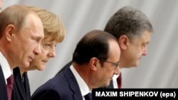 «Нормандська четвірка»: (справа наліво) керівники України, Франції, Німеччини і Росії. Мінськ, 11 лютого 2015 року