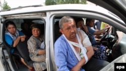 The suspect who died in custody, Mamataziz Bizrukov, had already lost a son to the violence in June 2010 (shown in file photo).