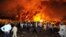 Flames rise from the Marriott hotel following a powerful bomb blast in Islamabad in 2008.