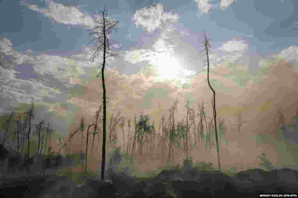 Smoke rises at the site of a glide bomb blast in Kharkiv, Ukraine, on September 17.