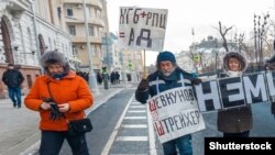 Учесници на маршот за одбележување на три години од смртта на Немцов во 2018 година 