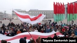 People take part in a rally protesting the upcoming Zapad 2017 war games in Minsk on September 8.