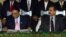 Pakistani President Asif Ali Zardari (left) signing a constitutional reform law as Prime Minister Yousuf Raza Gilani (R) looks on during a ceremony in Islamabad in April 2010.