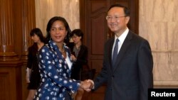 Сьюзан Райс һәм Ян Цзечи