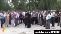 Armenia - Workers of a cement plant in Hrazdan go on strike to demand their back wages, 5Aug2014.