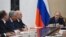 Președintele rus Vladimir Putin prezidează ședința Consiliului de Securitate de la Kremlin.