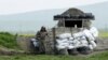 Nagorno-Karabakh -- An Armenian soldier stands guard at the checkpoint near Nagorno-Karabakh's town of Martuni, April 8, 2016