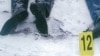 Тела убитого оппозиционного политика Алтынбека Сарсенбаева, его помощников Василия Журавлева и Бауыржана Байбосына, найденные возле поселка Коктобе близ Алматы 13 февраля 2006 года. Фото из книги Рахата Алиева «Крестный тесть». 