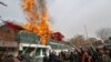 Afghan Police Fire On Cartoon Protesters