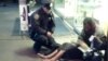 USA -- New-York, Photo of Officer Giving Boots to Barefoot Man Warms Hearts Online, Facebook photo