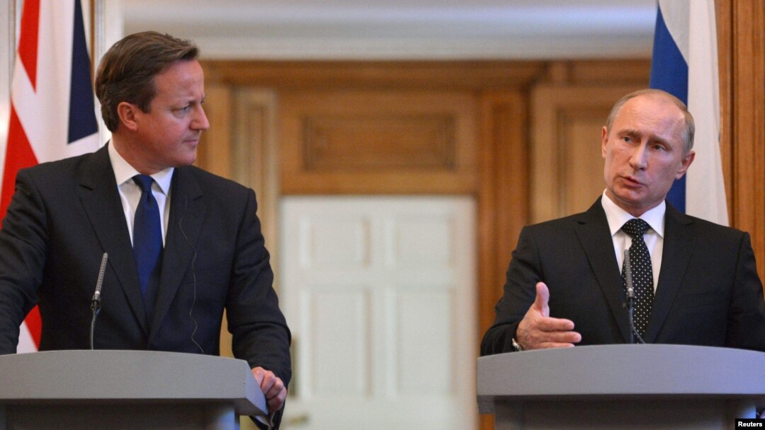 British Prime Minister David Cameron (left) and Russian President Vladimir Putin hold a joint news conference at 10 Downing Street, London, on June 16.