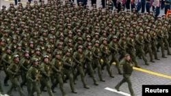 Russian soldiers take part in a scaled-back Victory Day parade in Moscow on May 9. 