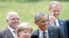 Obamayla Merkel miqrantlardan danışıblar