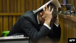 Оскар Пісторіус у залі суду в місті Преторія, Південноафриканська республіка, 13 березня 2014 року