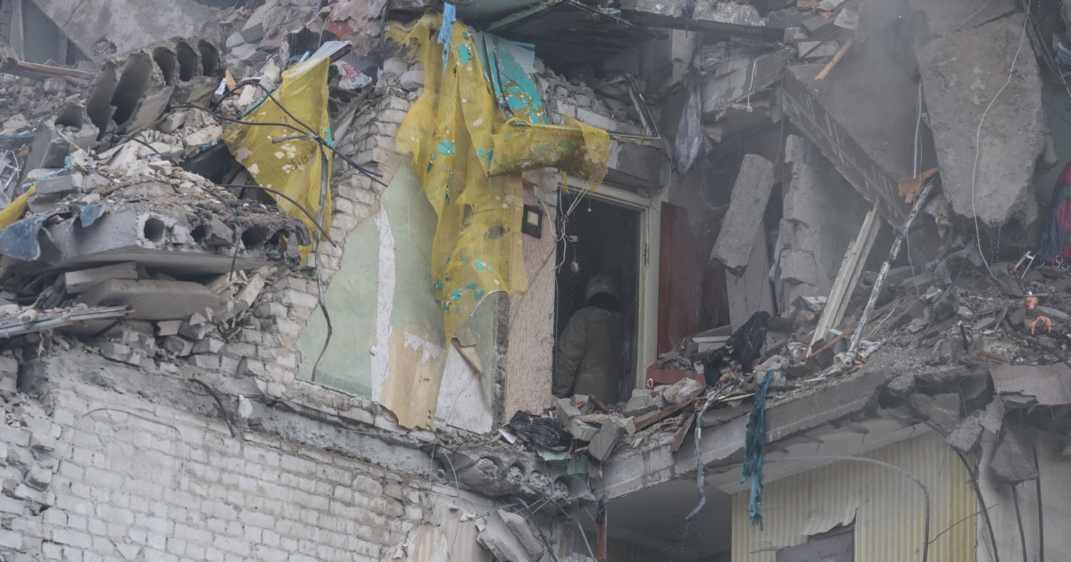Rescuers Scramble To Find Survivors Of Deadly Russian Strike On Kyiv