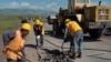 Armenia -- Workers repair a rural road, undated.