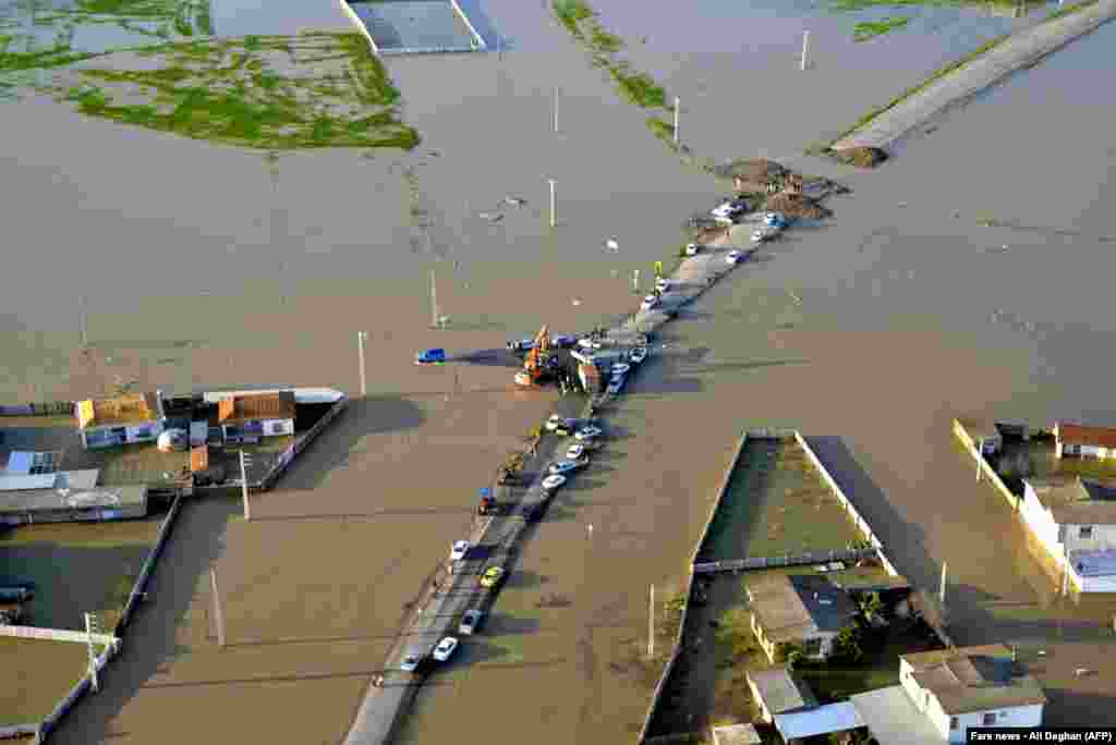 Flooded streets in the northern Iranian village of Agh Ghaleh, on March 23,2019.