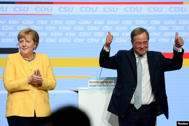 Ангела Меркель и Армин Лашет на предвыборной встрече в Берлине. Август 2021 года