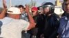 Former Kyrgyz President’s Supporters Attack Police With Stones GRAB