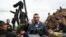 UKRAINE – Kyiv mayor Vitali Klitschko speaks to journalists in front of the Soviet monument to Ukraine-Russia friendship dismantled by workers in Kyiv on April 26, 2022