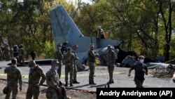На месте катастрофы Ан-26 в Харьковской области, Украина, 26 сентября 2020 года